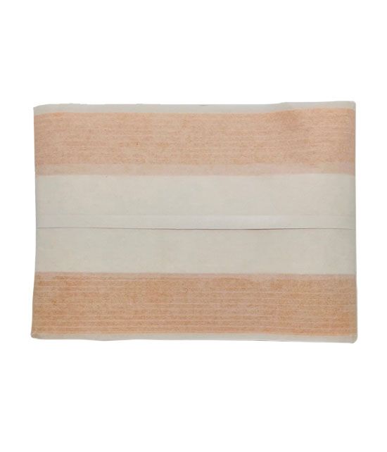 Un rouleau de pansement en coton tissé